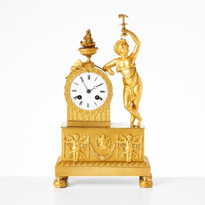 Zegar kominkowy z puttem obfitości brąz złocony, Empirowy XIX w 1830r
