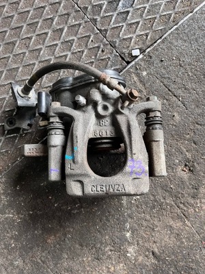 12 renault koleos ii суппорт тормозной tl 32353311c фото №1