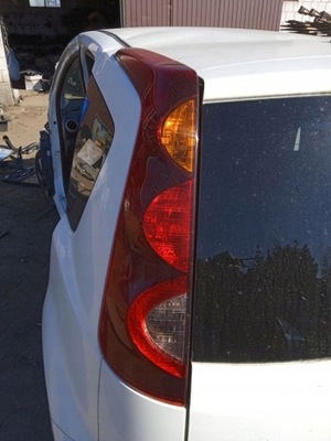 Nissan note e11 lift лампа левая задняя задняя oryg. фото №1