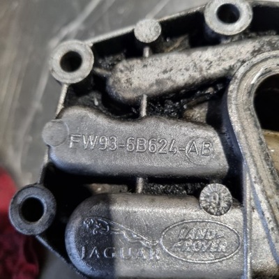 Корпус фільтра оливи fw936b624ab land rover range rover 3.0d 306dt фото №1