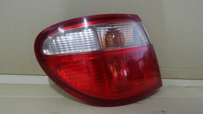 Almera n16 lift лампа лівий задня sedan фото №1
