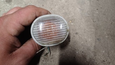 Daihatsu materia поворотник крыла фото №1