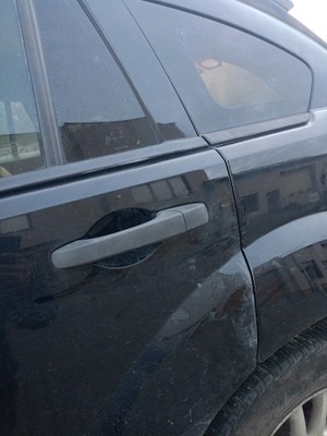 Ручка двері лівий задня dodge caliber 06-10 фото №1