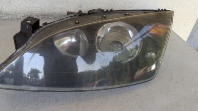 Лампа передня перед ліва ford mondeo mk3 ксенон тонована фото №1