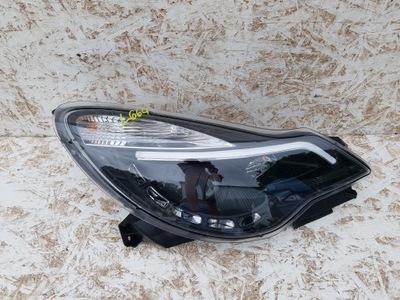 Opel corsa e лампа права перед передня фото №1