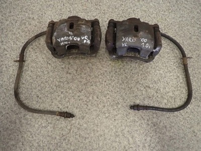 Toyota yaris 99-05 суппорт передний правый lub левый фото №1