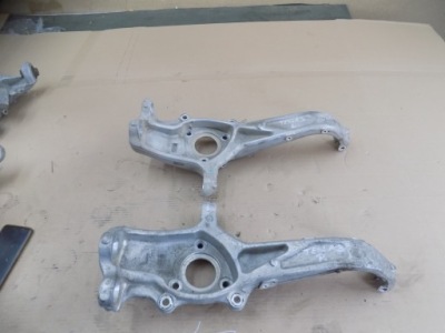 Поворотный кулак правый перед tesla 3 1044316-00-e оригинал фото №1