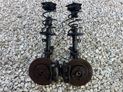 Nissan micra k12 note поворотний кулак амортизатор лівий фото №1