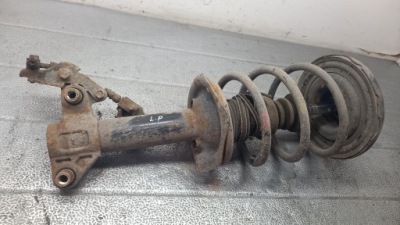 Амортизатор левый перед nissan primera p12 1.9d 03r hb фото №1