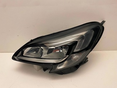Opel corsa e ліва лампа 13381343 фото №1