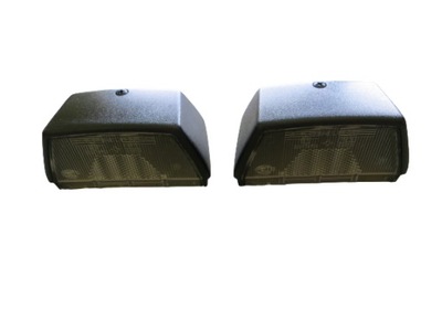 Корпус ліхтарі підсвітка номерного знака hella 2 szt фото №1