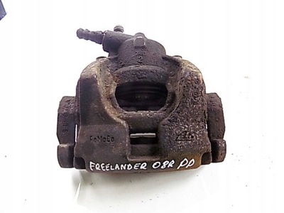 Land rover freelander 2 ii супорт гальма правий перед фото №1