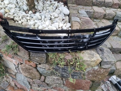Hyundai ix35 10-15 решітка середня w бампер перед фото №1