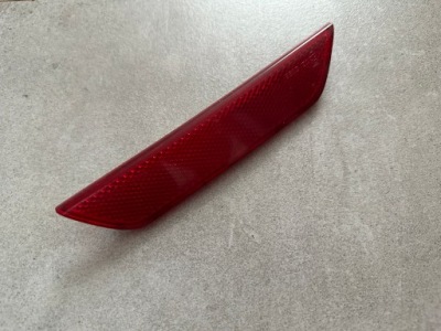 Отражатель бампера задний  левый 12831581 saab 93 ii фото №1