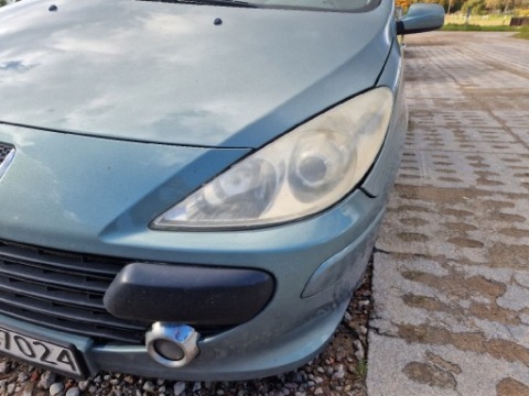 ФАРА ЛІВИЙ ПЕРЕДНІЙ PEUGEOT 307SW РЕСТАЙЛ 2005 