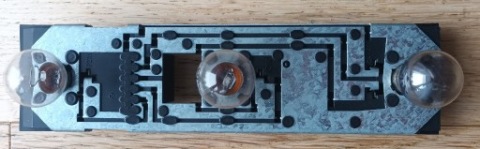 ВКЛАДКА ФАРИ МІНІ R50/R52/R53 TYL. ORYGINAL. 