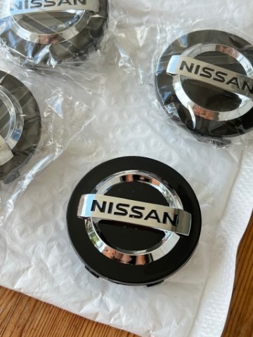КОЛПАЧКИ NISSAN 60 MM - КОЛЕСНЫЕ ДИСКИ NA FELGI, КОМПЛЕКТ 4 SZT. 