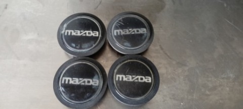 DEKIELKU КОВПАЧКИ KAPSELKI КОЛЕСНІ ДИСКИ ДИСКІВ MAZDA OEM 54 MM #2094 I #2504 