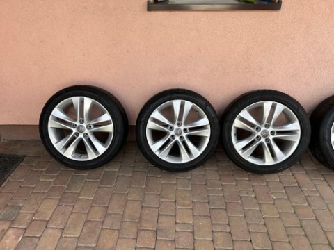 ДИСКИ ALUMINIOWE18 5X115(OPONY PIRELLI P0) OPEL, CHEVROLET, CHRYSLER, DODGE 