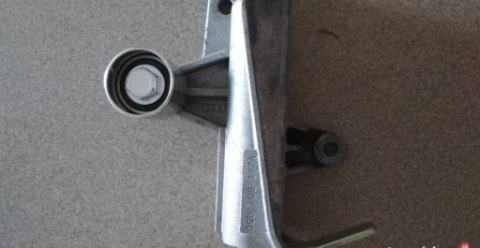 НАТЯГУВАЧ VW AUDI OE 06B109477A - 30 TYS.NOWA РОЛИК 