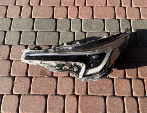 ЛЕВАЯ ФАРА TOYOTA COROLLA E21 УНИВЕРСАЛ ХЭТЧБЕК РЕСТАЙЛ 81150-02X10 