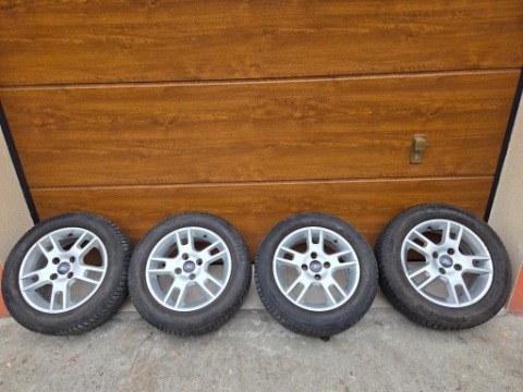 ТИТАНОВІ ДИСКИ FORD 15 ВІДСТАНЬ 4X108 ШИНИ CALOROCZNE GOODYEAR VECTOR 4SEASONS 