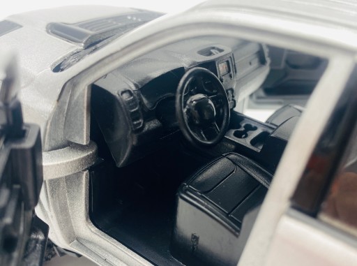 RAM 1500 Crew Cab Laramie 2019 1:27 Motormax 79357 серый