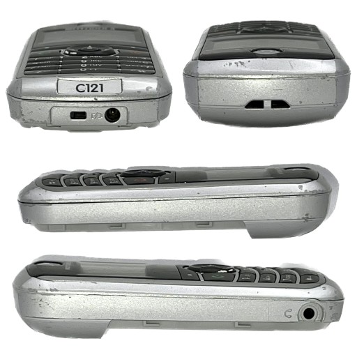 Мобильный телефон MOTOROLA C121 серебристого цвета {УНИКАЛЬНЫЙ}