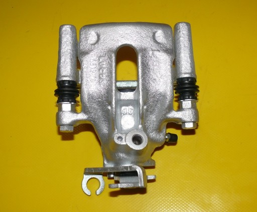 ZACISK LEWY TYŁ VOLVO S40 V40 260/10 94-04
