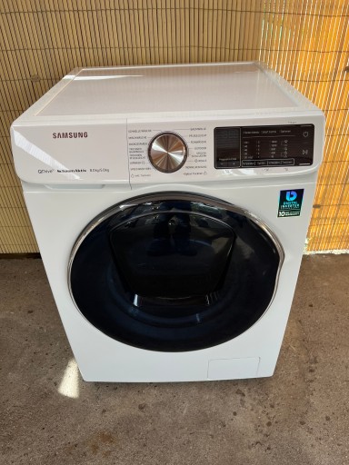 Стирально-сушильная машина Samsung WD81N642OOW/EG 8кг/5кг