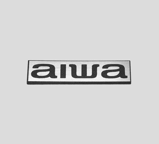 Наклейка-эмблема AIWA 38x9 мм*СЕРЕБРЯНАЯ