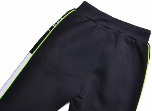 GROS Spodnie dresowe czarne joggery Dresy lekko ocieplane r 110/116