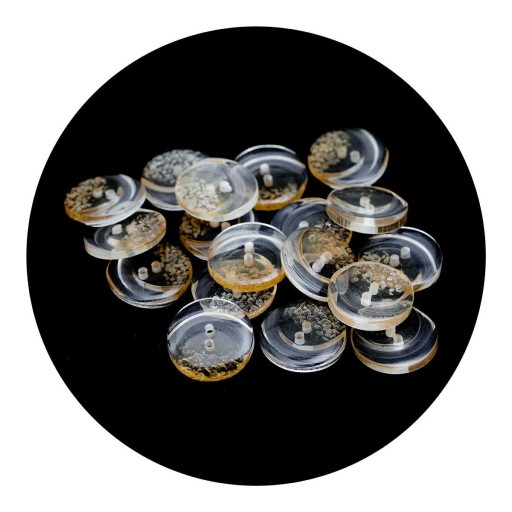 Guzik 23mm dwie dziurki 10szt. transparentny