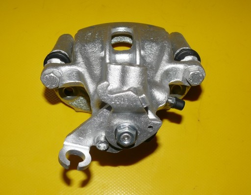 ZACISK LEWY TYŁ VOLVO S40 V40 260/10 94-04