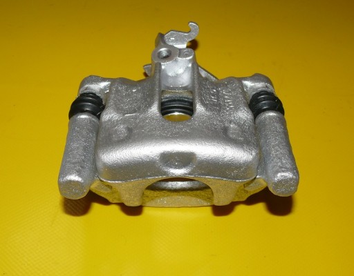 ZACISK LEWY TYŁ VOLVO S40 V40 260/10 94-04