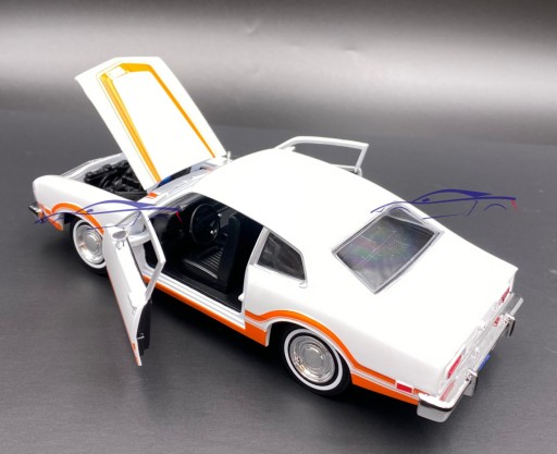 Ford Maverick Grabber белый 1:24 Motormax 79043