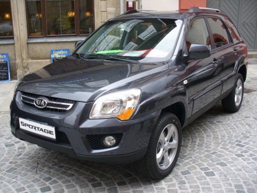 NAKŁADKI PRZEDNICH LAMP KIA SPORTAGE JE 08-10 LIFT