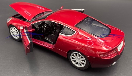 Aston Martin DB9 Coupe 1:24 модель Motormax 73321 красный