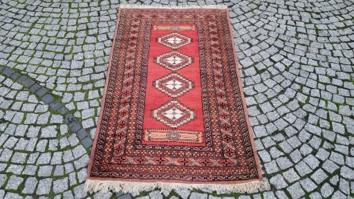 WEŁNIANY DYWAN BUCHARA R. TKANY PAKISTAN 94/160CM