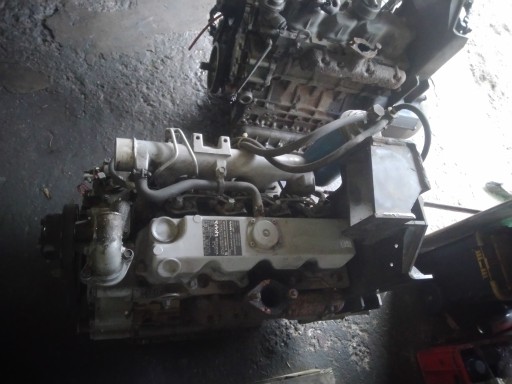Дизельный двигатель Kubota V2203 Carrier Vector Bobcat Schofler