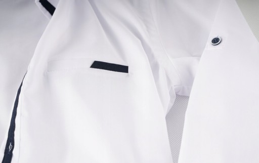 Koszula dla chłopca elegancka długi rękaw biała z granat kołnierz KADA 128