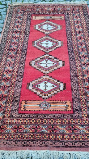 WEŁNIANY DYWAN BUCHARA R. TKANY PAKISTAN 94/160CM