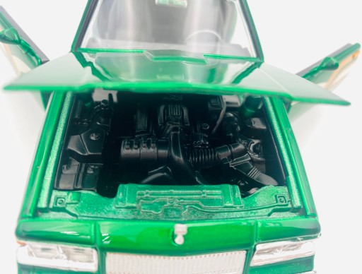 Buick Regal 3.8 SFI Turbo 1:24 модель Motormax 79023 зеленый