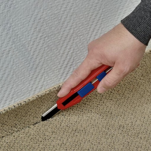 Нож Knipex со сломанным лезвием Tapet Tapeciak 18 мм