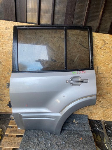 DRZWI LEWY TYŁ TYLNE MITSUBISHI PAJERO III 5D SZYBY
