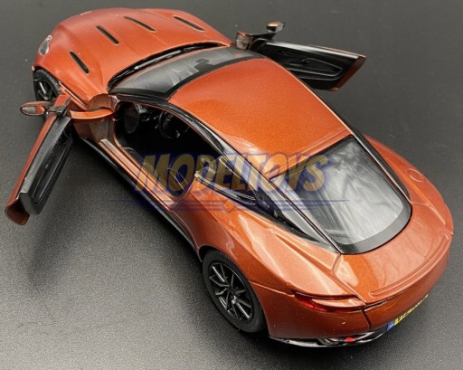 Aston Martin DB11 1:24 модель Motormax 79345 cinnebar orange