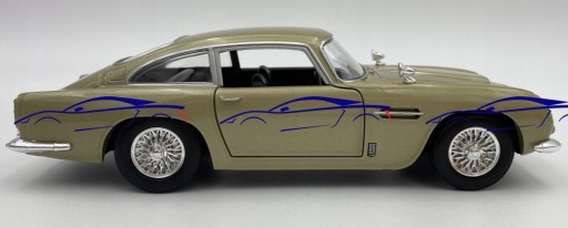 Aston Martin DB5 1:24 модель Motormax 79375 золото