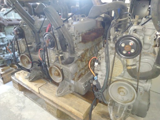 Дизельный двигатель Kubota V2203 Carrier Vector Bobcat Schofler