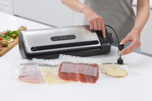 Вакуумный упаковщик FoodSaver для пищевых продуктов + пакеты.