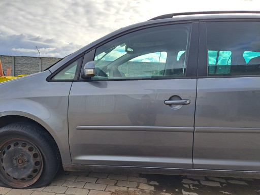 Vw touran 03-15 рік ліве двері переднє передні , фото